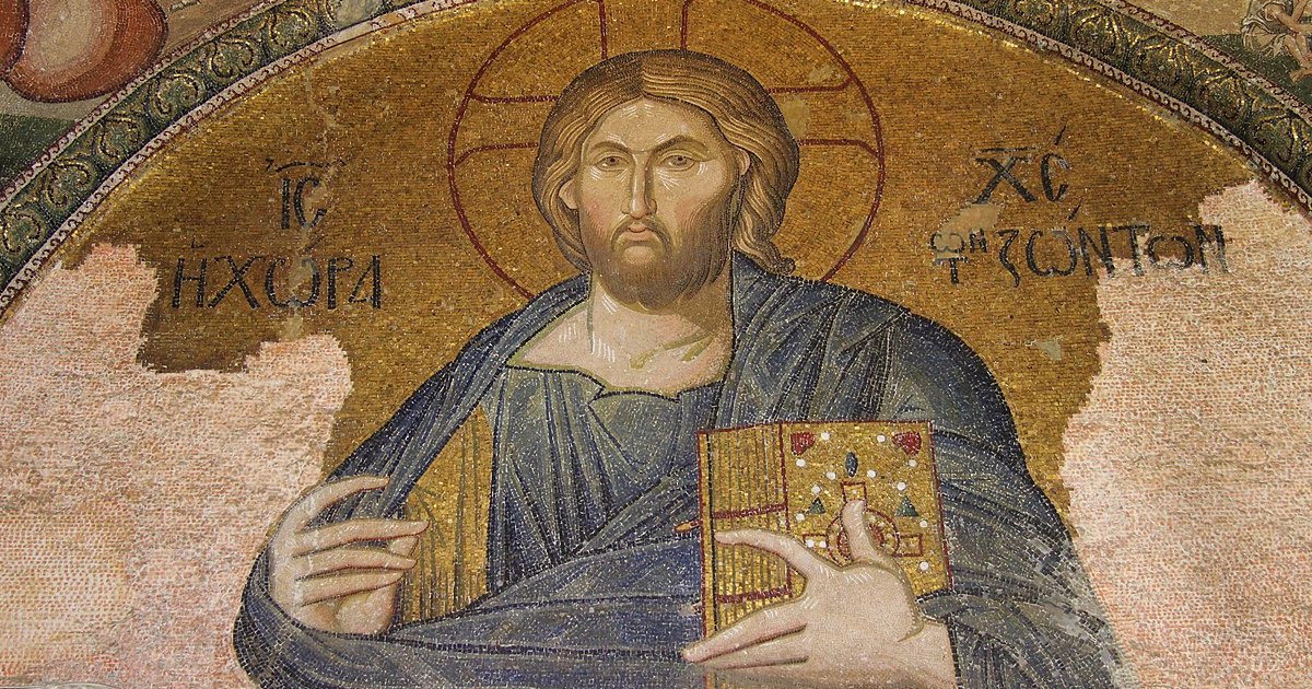 Ancient Byzantine mosaic of Jesus Christ, known as Christ Pantocrator, in the Hagia Sophia, with a golden halo, holding a bejeweled book, against a gold background, displaying traditional Christian iconography and inscriptions in Greek.